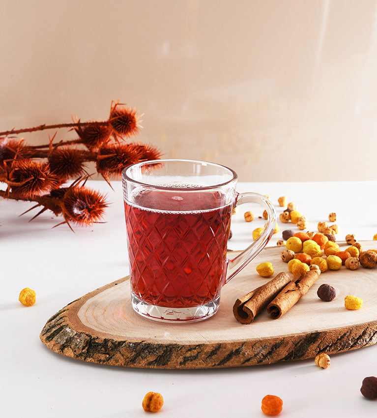 Paşabahçe Ruby patterned mug filled with tea