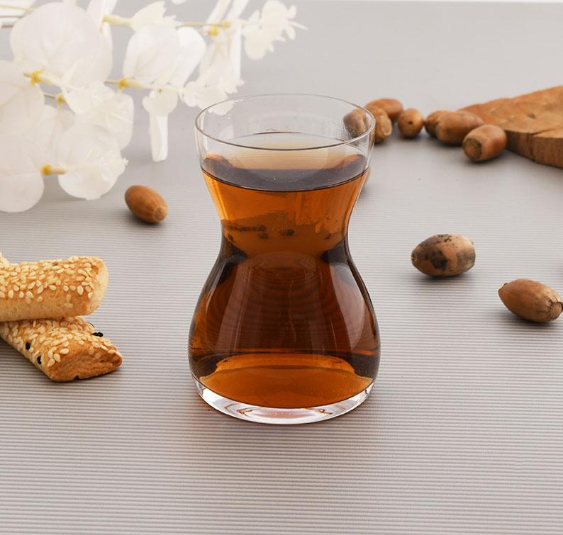 Paşabahçe Ruba waisted glass filled with tea