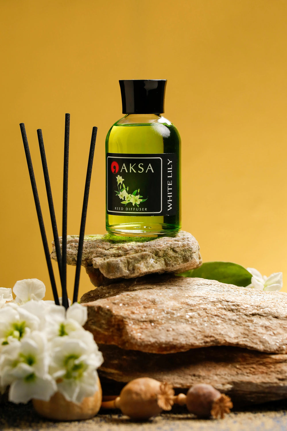 Aksa White Lily fragrance bottle and diffuser reeds