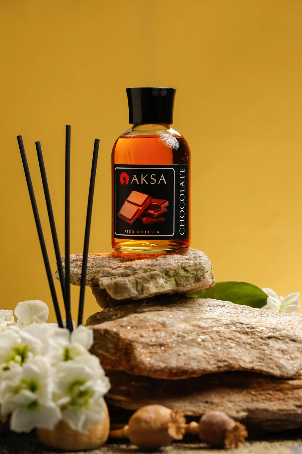 Aksa Chocolate fragrance bottle and diffuser reeds