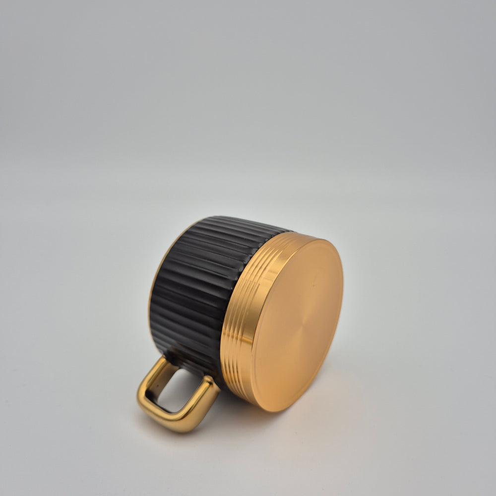 Eylul black cup showing the gold-coloured base