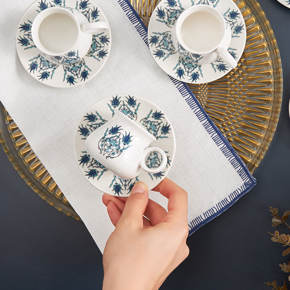 Close-up of Karaca Bursa coffee cup on its patterned saucer