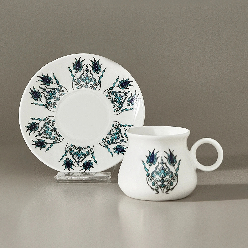 Karaca Bursa coffee cup beside an upright patterned saucer