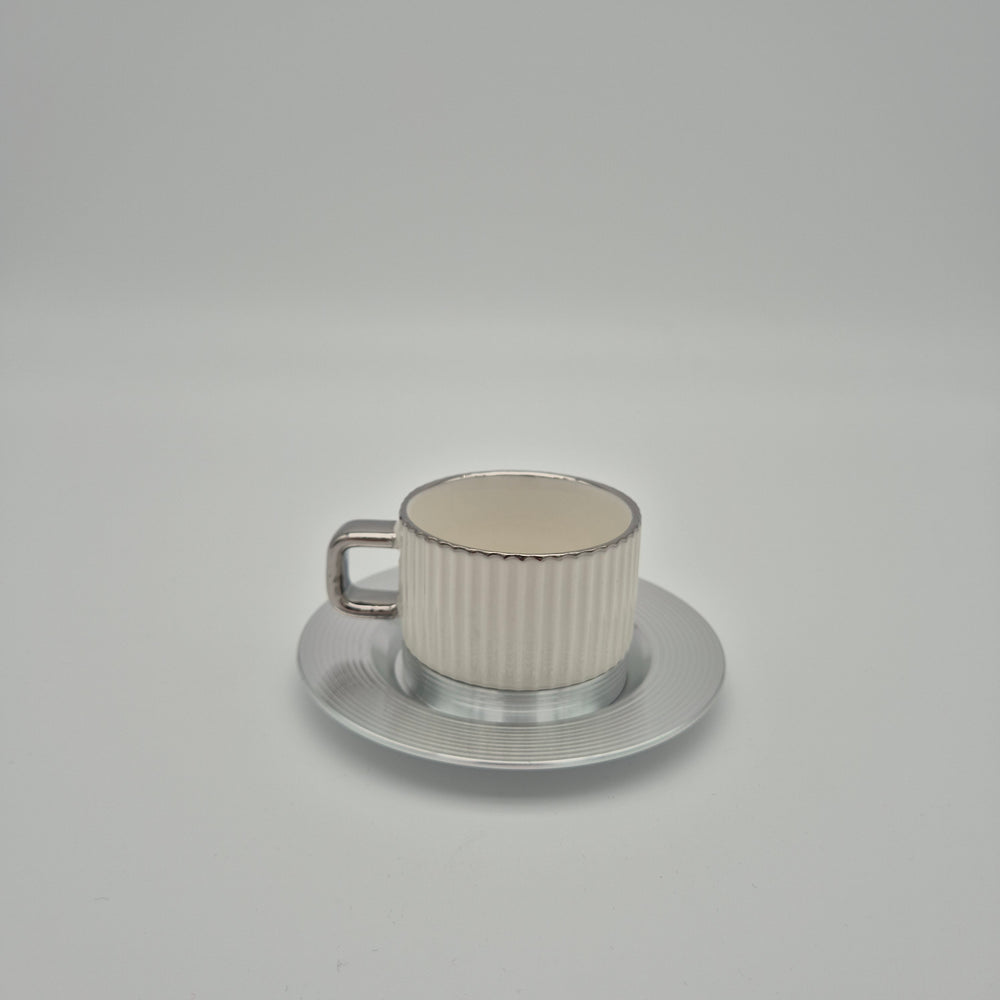 White Eylul coffee cup with silver-coloured saucer
