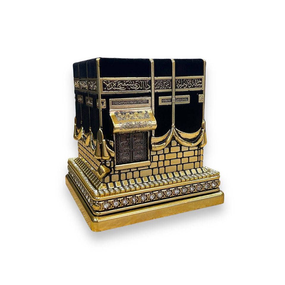 Ensar Kaaba decor showing the door and gold-coloured detailing