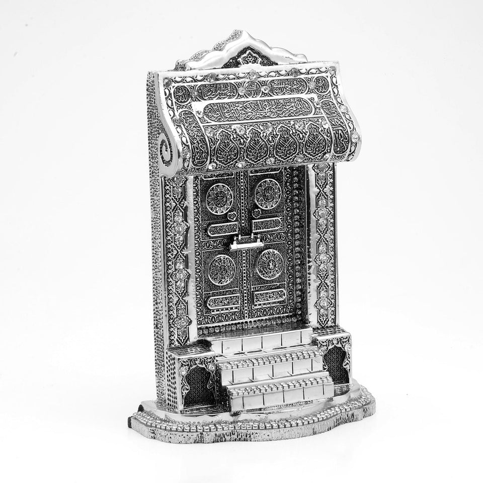 Silver-coloured Kaaba door ornament with a stepped base