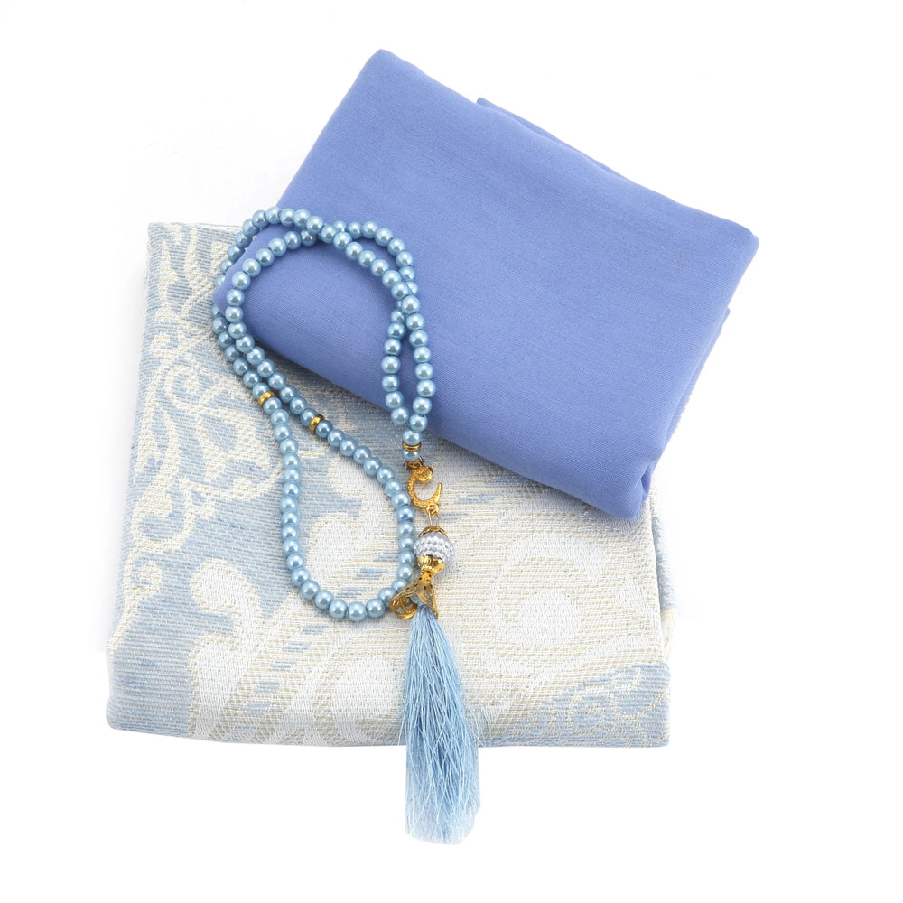 Afra prayer accessories with blue scarf, folded mat and prayer beads
