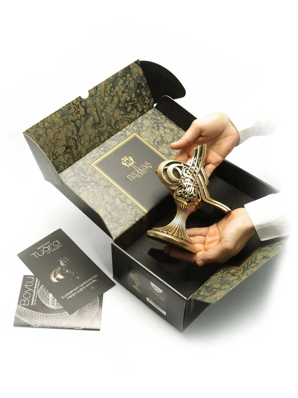Nakkaş tughra ornament shown in its presentation box