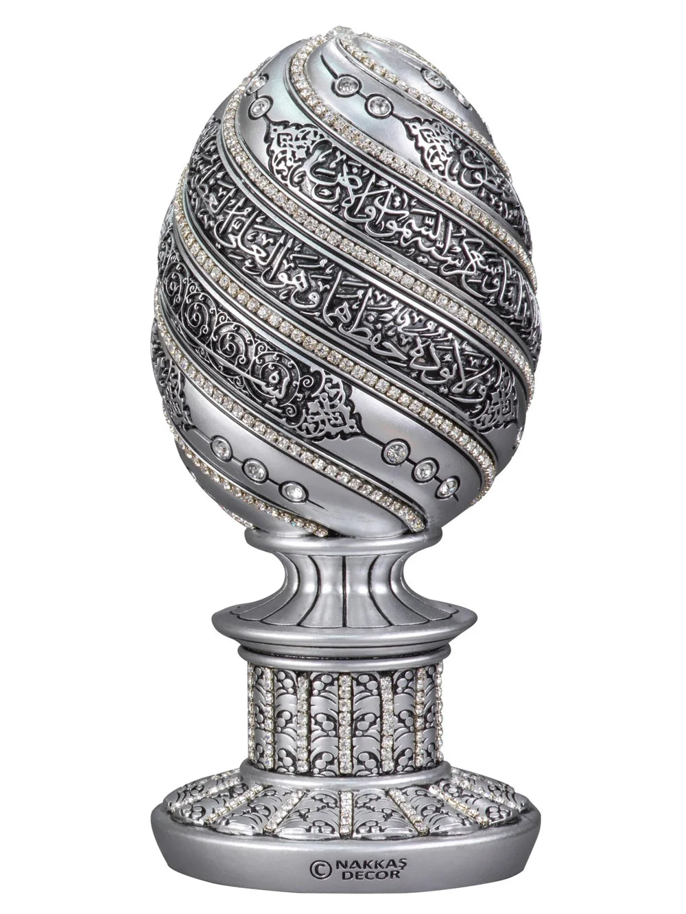 Angled view of silver-coloured Ayatul Kursi egg ornament