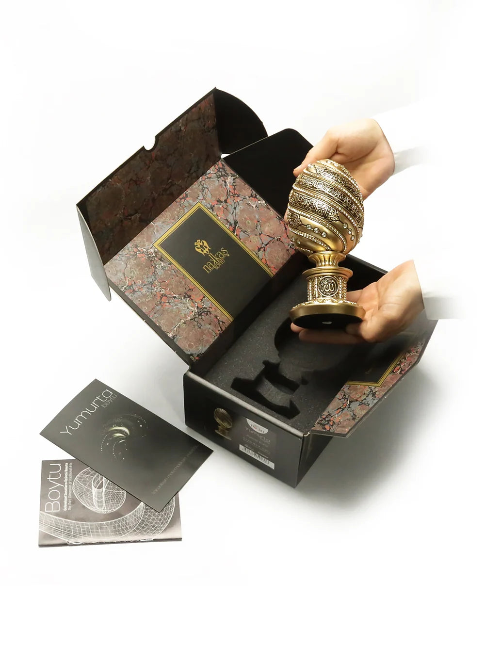Ayatul Kursi egg ornament shown in presentation packaging
